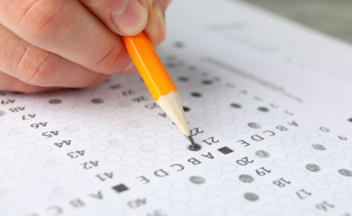 Student fills answers on test sheet